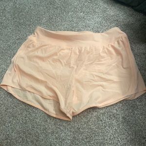 peach athletic shorts